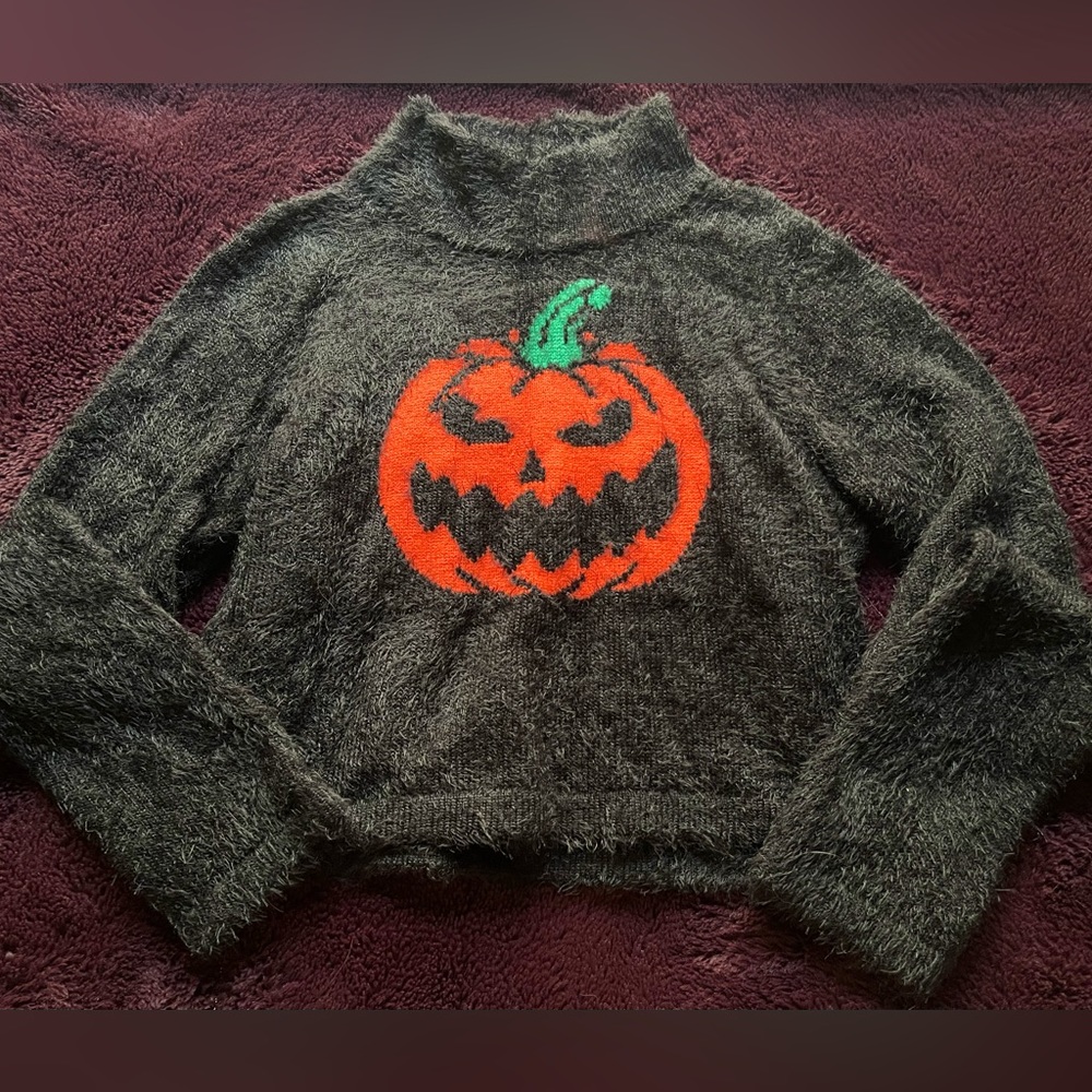 Dolls Kill ‘Trickz N’ Treatz’ cropped fuzzy pumpkin sweater